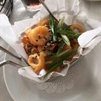 Kung Pao Calamari · Fried calamari tossed in an Asian sweet and sour sauce.