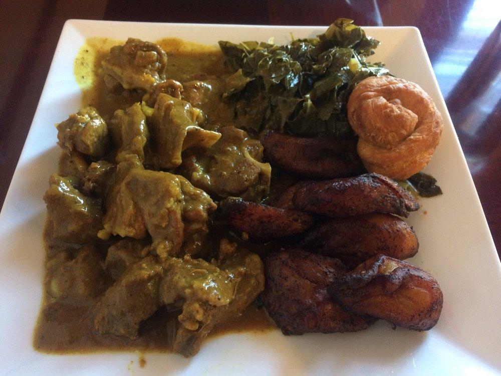 Curried Goat · Mild. Locally farmed goat marinated and stewed in curry sauce. Served with 2 vegetable sides and Jonny cake.