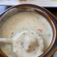 Clam Chowder Soup · A thick hearty soup consisting of clams, potatoes, onions within a milk or cream base 