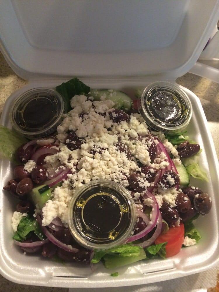 Greek Salad · Imported feta cheese and Kalamata olives mixed with lettuce, tomatoes, onions and pepperoncini.