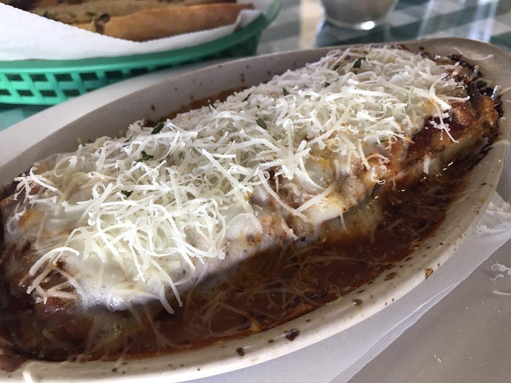 Lasagna · Homemade recipe. Served with a small side salad and bread.