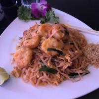 Pad Thai · Famous Thai stir-fried noodle with vegetables, egg, tofu lime and grounded peanuts. Spicy.