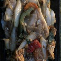 Drunken Noodle · Delicious flat wide noodle with basil, red peppers, egg, carrots and onions in spicy chili g...