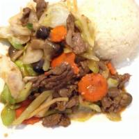 Mongolian Beef · Sliced of beef sauteed with onions, bamboo shoots, mushrooms, cabbage, celery and carrots in...