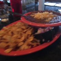 Frito Pie · Chili (no beans) topped with cheese and served with a big side of Frito's. Diced onions and ...