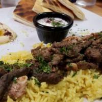 Shawarma Combo · A combination of beef, chicken and lamb shawarma served with rice, hummus, our freshly baked...
