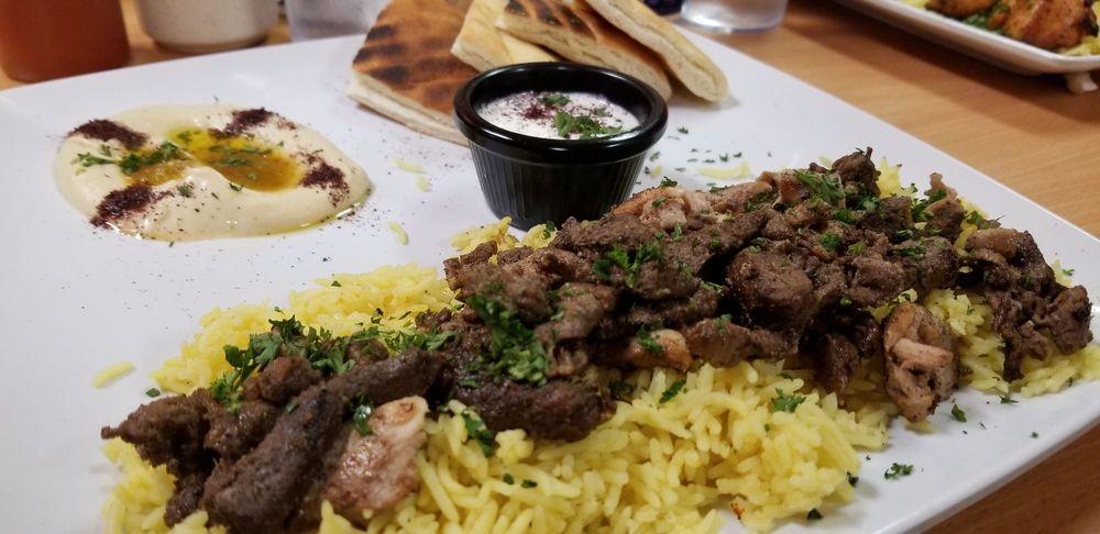 Shawarma Combo · A combination of beef, chicken and lamb shawarma served with rice, hummus, our freshly baked pita bread. Served with soup or salad.