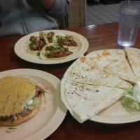 Quesadilla · Served with choice of meat.
