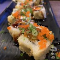 Vegas Roll · Crab meat, avocado, cream cheese, deep fried, topped with masago, scallion, eel sauce and sw...