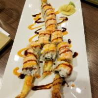 Scorpion Roll · 2 shrimp tempura inside, soft shell crab, avocado, spicy crab, topped with shrimp, spicy may...