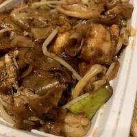 Char Kway Teow · Malaysian-famous stir-fried flat rice noodles with shrimp, squid, bean sprouts and eggs with...