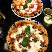 Margherita Pizza · Tomato sauce, homemade fresh mozzarella cheese, extra virgin olive oil and basil. Individual...
