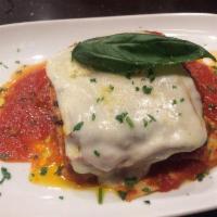 Lasagna · Slow-cooked Bolognese sauce with ricotta and mozzarella.