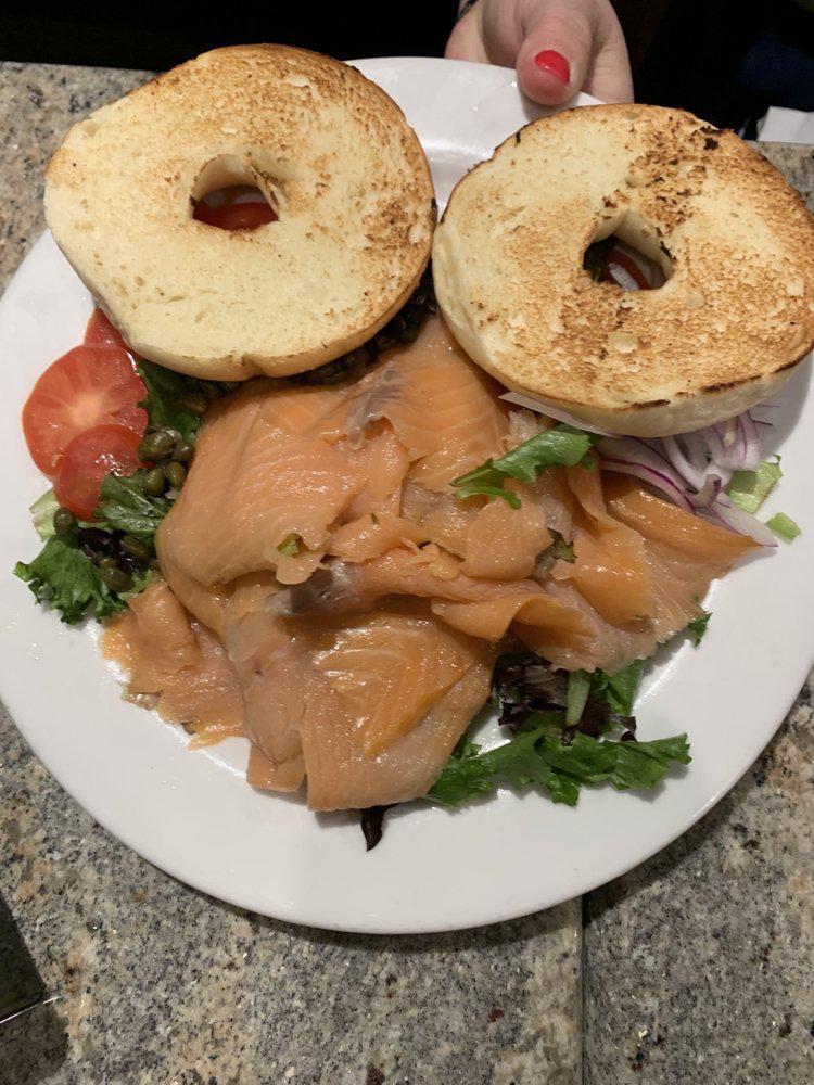 Lox and Bagel · Lox, red onion, greens, capers, cream cheese and bagel.