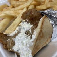 Gyro Wrap · A mixture of Fresh ground beef and lamb, combined with herbs accompanied by fresh tomatoes, ...