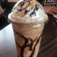 Dingo · Milkshake made with Espresso, Chocolate, Caramel, Vanilla Ice Cream with Whip Cream on top.