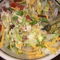 Chopped Salad · Romaine blend, grilled chicken, bacon, bleu cheese, avocado, tomato, green onion, house vina...