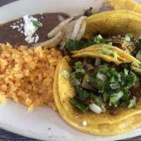 3 Street Tacos · 3 Streer tacos served with rice and beans, grilled onios on the side with your our choice of...