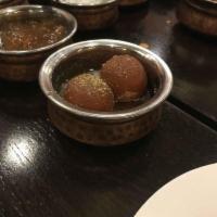 Gulab Jamun · The most popular dessert in India. flour doughnut smothered in honey and drenched in saffron...