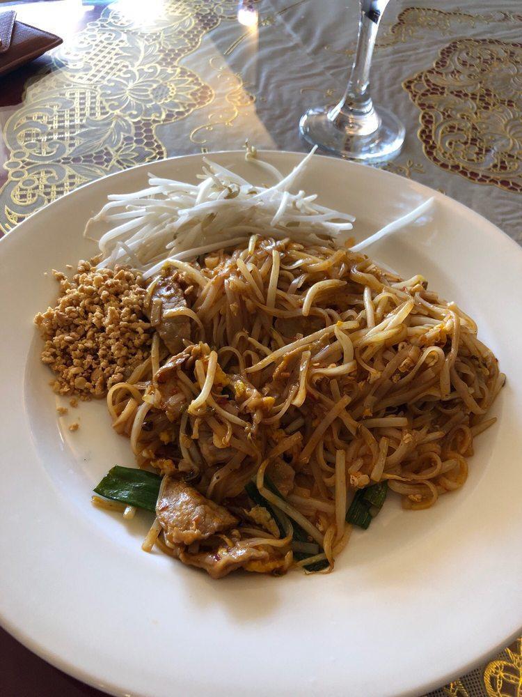 Pad Thai · Stir fried thin rice noodle, bean sprout, scallion, egg and topped with ground peanut. (contains fish sauce)