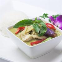 Green Curry · Bamboo shoot, red & green bell pepper, basil leaves and eggplant with coconut milk served wi...
