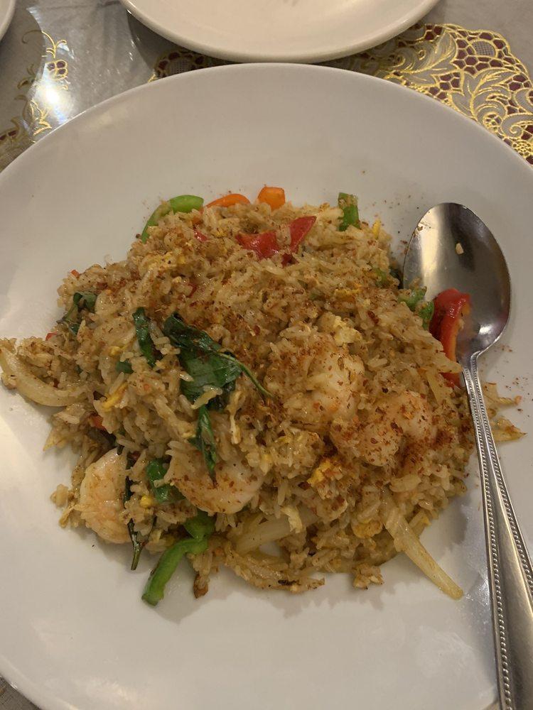 Spicy Fried Rice · Steamed rice with chili, egg, red & green bell pepper, onion, garlic, and basil leaves. Curry