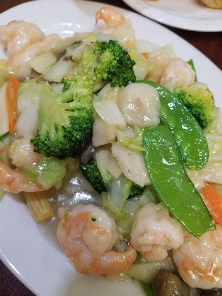 Crystal Shrimp · Shrimp sauteed with vegetables in a delicate white sauce.