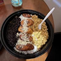 Pabellon · Shredded beef, white salty cheese, sweet plantains and black beans.