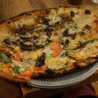 Spinach and Artichoke Pizza · Marinara, baby spinach mozzarella, fresh tomatoes, artichokes, fontina and herb oil.