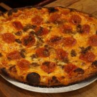 Italiano Pizza · Marinara, mozzarella, pepperoni and house sausage.