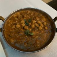 Chana Masala · Chickpeas simmeed in a nicely spiced in onion gravy
