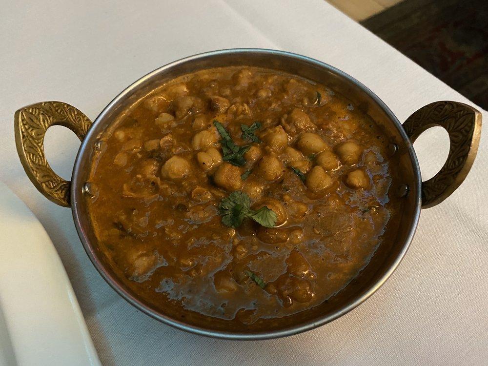 Chana Masala · Chickpeas simmeed in a nicely spiced in onion gravy