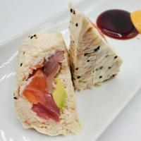 Superman Burrito Roll · Salmon, yellowtail, tuna, crab meat and avocado. Wrapped with soy paper. No rice.