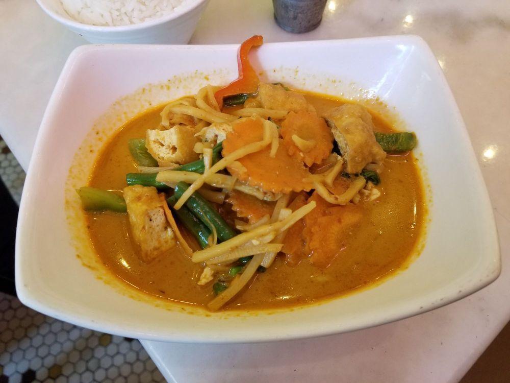 Red Curry · Thai red curry paste with bamboo shoots and basil in coconut milk. Spicy.