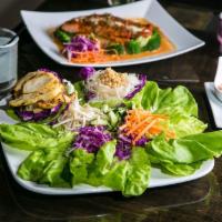 Thai Lettuce Wraps · Create your own Thai lettuce wraps. Served with satay chicken strips, carrots, bean sprouts,...