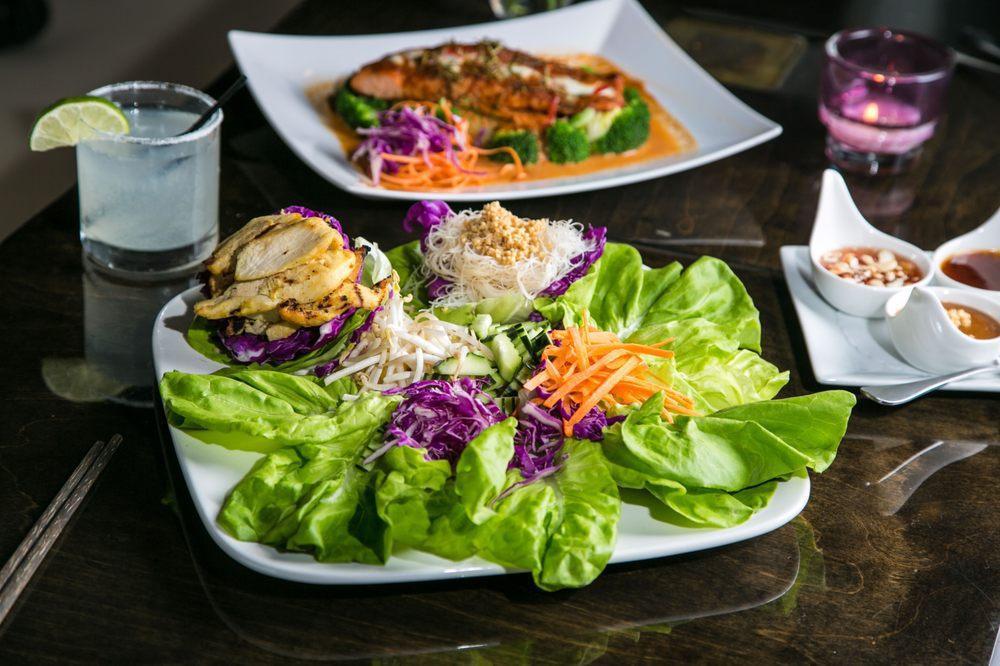 Thai Lettuce Wraps · Create your own Thai lettuce wraps. Served with satay chicken strips, carrots, bean sprouts, noodles and lettuce leaves with peanut sauce, tamarind, cashew nut sauce and red sweet chili.
