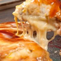 Pork Okonomiyaki · Most traditional okonomiyaki with pork mixed into batter served with house special sauce and...