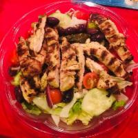 Greek Salad · Mixed greens, tomatoes, cucumbers, crumbled feta, red onions, Kalamata olives, grape leaves ...