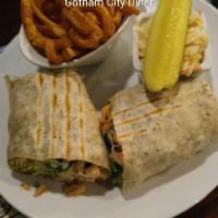 Chicken Caesar Wrap · Marinated grilled chicken with romaine lettuce, shredded Romano and Caesar dressing.