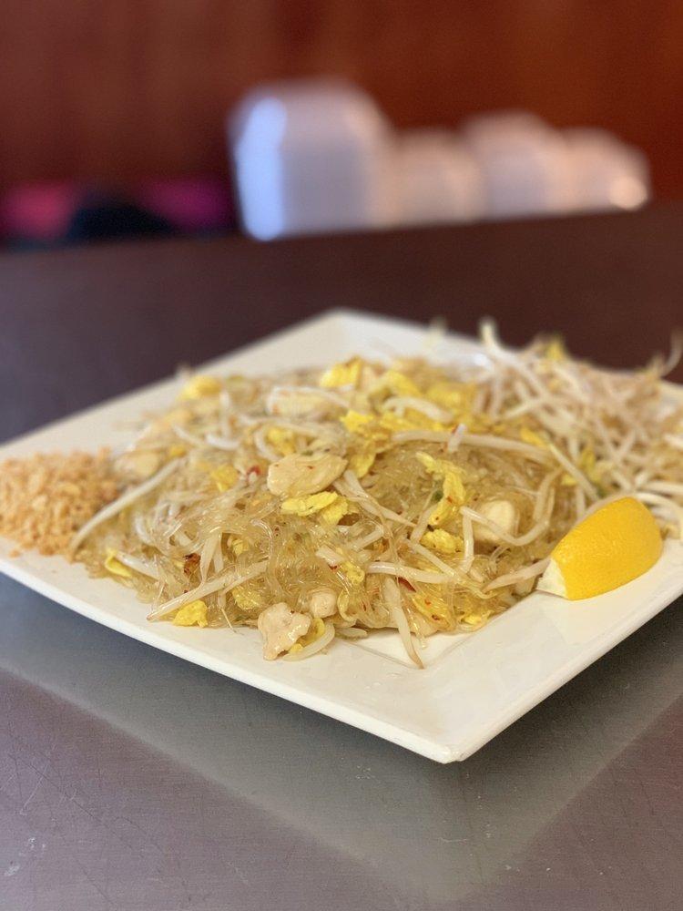 Pad Thai Noodles · Rice noodle, egg, scallion, sprouts, wok stirred in sweet and tangy glaze. Topped with crushed peanuts.