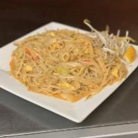 Curry Noodles · Rice noodles, egg, green onions, bean sprouts in a curry sauce.
