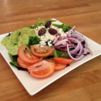 Greek Salad · Spring Mix, Tomatoes, Red Onions, Cucumbers, Bell Peppers, Feta Cheese, Kalamata Olives Topp...