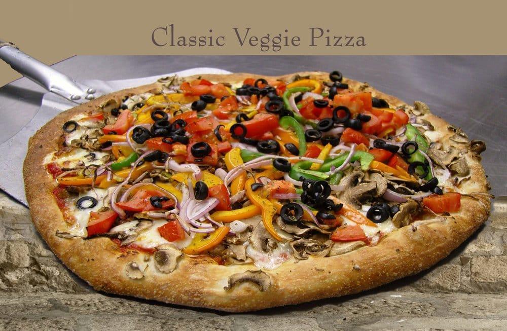 Veggie Pizza · Mushrooms, black olives, bell peppers, red onion and tomatoes. Vegetarian.