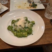 Gnocchi · Homemade potato spinach gnocchi, butter, italian pancetta, Porcini truffle cream sauce, gran...