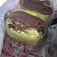 Pastrami Sandwich · Includes a side dish of coleslaw or potato salad.