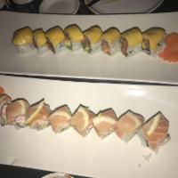 Golden State Roll · Snow crab, avocado inside, and fresh salmon topped with lemon.