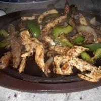 Chicken Fajita Salad · Grilled chicken over a bed of shredded lettuce, pico de gallo, cucumbers, avocado slices and...