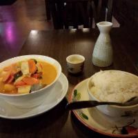 Pumpkin Curry · Pumpkin, bell pepper and sweet basil in red curry. Spicy.