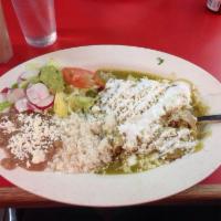 Enchiladas Verdes · With chicken, salad, rice and beans.