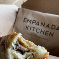 Mushroom and Goat Cheese Empanada · Saute onions, sauteed mushrooms, goat cheese and touch of mozzarella.